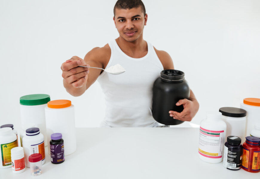 man holding testosterone supplements